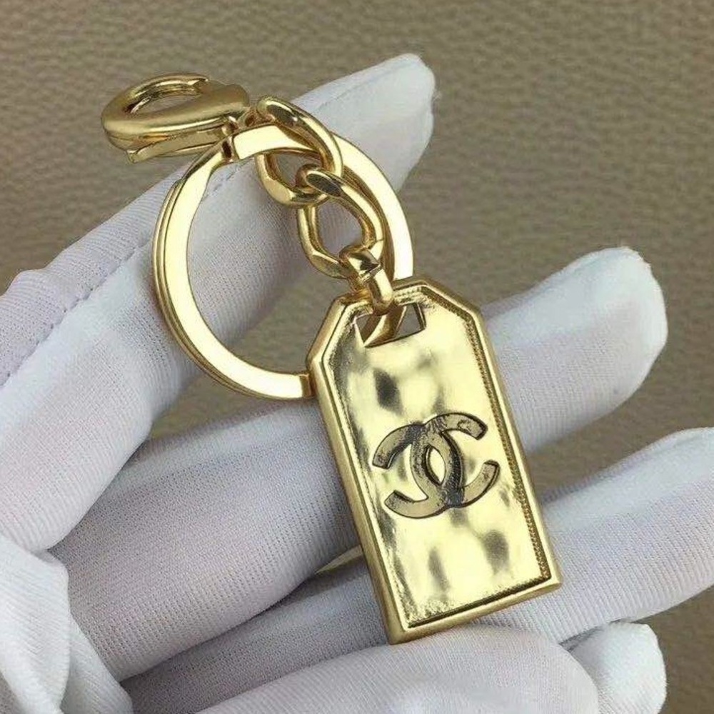 Like-New CHANEL Gold Tone Keychain/Bag Charm